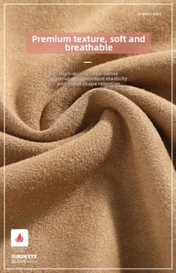 Gros plan du tissu Dralon marron montrant la texture douce et la matière élastique
