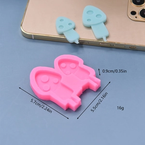 Pink silicone mushroom mold for fondant or clay with exact size measurements