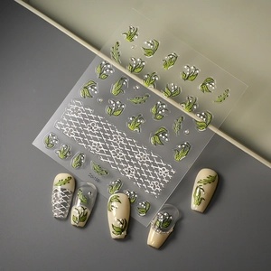 3D embossed lily of the valley nail stickers with lace and pearl accents for manicures