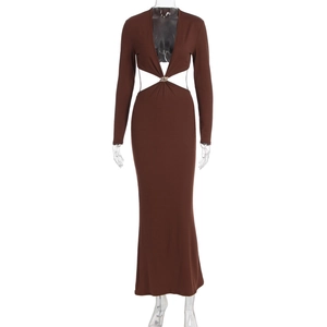 Detail view of deep V-neckline and waist cutout with metal ring on brown dress