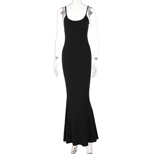 Detail view of black backless long dress with slim fit mermaid hem and thin straps