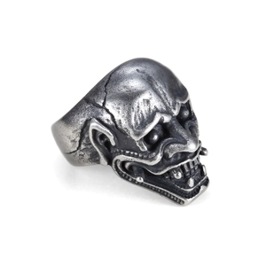 Mens vintage stainless steel skull ring with detailed demon mask design on white background