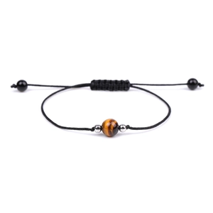 Detail of adjustable black braided rope bracelet with natural tiger eye stone and silver beads