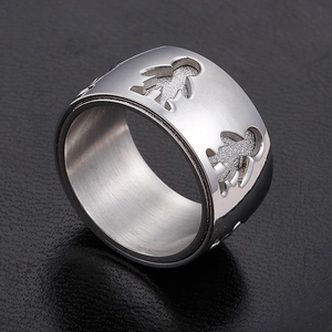 Titanium steel spinner ring with cutout boy and girl patterns in silver finish