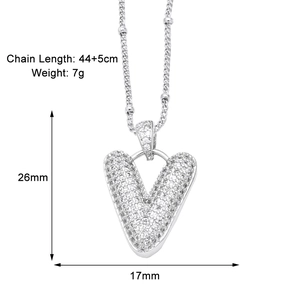 Detail view of silver V letter necklace with zircon pavé, dimensions 26mm x 17mm
