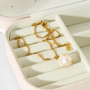 Elegant baroque pearl necklace in 18K gold plated stainless steel on jewelry gift box