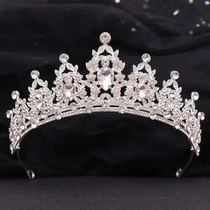 Detail shot of crystal bridal crown with sparkling rhinestones on silver metal base