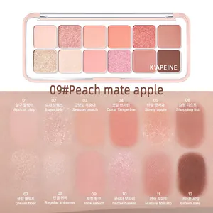 Detail of 12-color eyeshadow palette with peach and coral tones in matte and shimmer