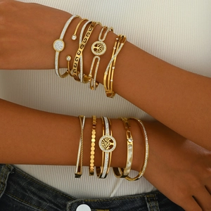 Exaggerated gold stainless steel open bangles with Tree of Life and Greek key design