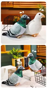 Detailed view of plush realistic pigeon dolls in white and grey-green soft short fur