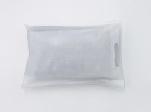 Detail of frosted translucent plastic packaging bag with handle hole for baguette bag