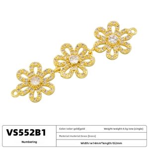 Detailed macro of brass triple flower jewelry connectors with sparkling cubic zirconia pavé