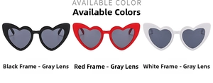 Close-up of heart-shaped sunglasses in black, red, and white frames with grey lenses