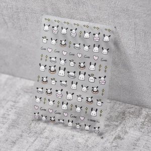 Detail of embossed Pochacco nail stickers with cute stars and heart patterns on PET sheet