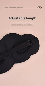 Detail of adjustable elastic strap with buckle on a black light-blocking sleep mask