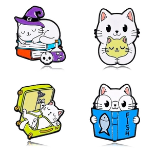 Set of four cute magic cat enamel pins in colorful metal styles for backpacks and clothes