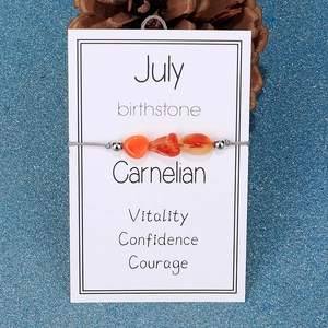 Detailed view of July birthstone bracelet with raw carnelian beads and silver accents