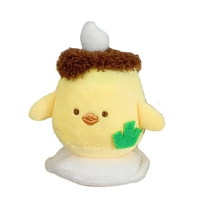 Cute yellow plush pudding dog keychain charm with brown hat and green leaf detail