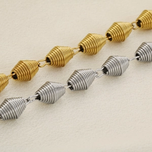 Bracciale a catena geometrica a spirale in oro e argento realizzato in acciaio inossidabile