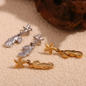 18K gold plated stainless steel earrings featuring starfish and seahorse pendants