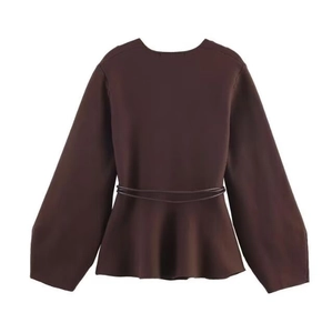 Chocolate brown peplum knit sweater with a matching waist tie and minimalist crew neck