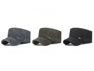 Detailed close-up of textured herringbone wool caps in grey, brown, and black colors