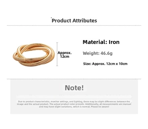 Detail view of gold metal swirl bracelet showing 46.6g weight and 12cm by 10cm size