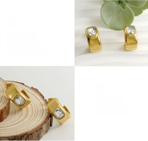 Détail des boucles d'oreilles en C plaquées or 18K avec pierre de zircon rectangulaire