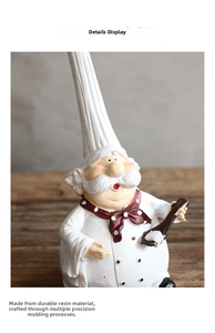 Close-up of resin chef figurine with white hat and red scarf for restaurant decor