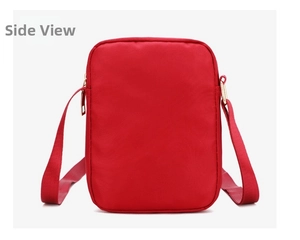 Detailed back view of the red nylon crossbody phone bag with a gold zipper and strap
