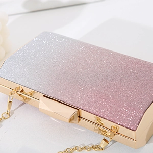 Sparkly silver to pink gradient evening clutch bag with gold chain strap for women