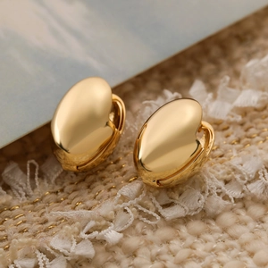 Minimalist gold-plated geometric oval hoop earrings with a polished metallic finish