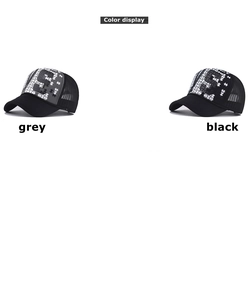 Detailed color display of grey and black trucker hats with 3D love print and mesh