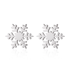 Macro detail of silver snowflake stud earrings in polished stainless steel with reflection
