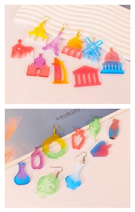 Colorful gradient resin earrings showing Eiffel Tower and bottle shapes with vibrant finish