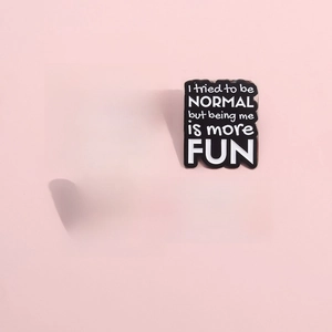 Set of 4 creative metal enamel pins with funny English slogans on a pink background