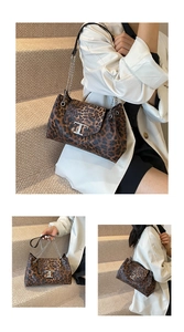 Detail view of leopard print shoulder bag with silver chain and T-shaped metal clasp