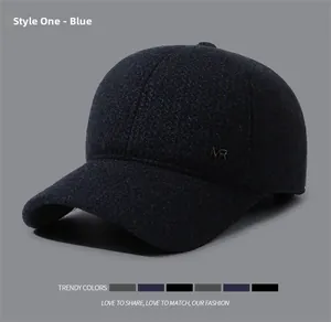 Detailed close-up of dark blue winter baseball cap with VR metal badge and wool texture