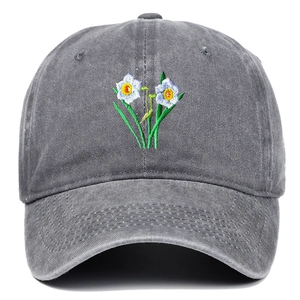 Close-up of white daisy flower embroidery on washed cotton canvas dark grey baseball cap