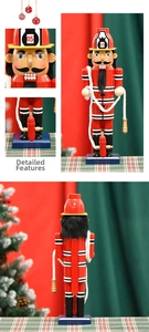 Detailed close-up of 36cm wooden firefighter nutcracker with fire hydrant detail and red uniform