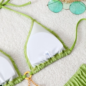 Detail of light green textured bikini top with removable pads and gold chain accents