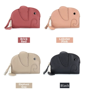 Detail of four colorful elephant shaped leather coin purses with pebbled texture