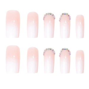 Pink and white ombre press on nails with glitter finish and colorful rhinestones