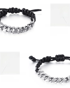 Detail showing the fusion of polished stainless steel chain and black braided rope textures