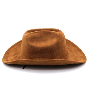 Close-up of brown suede texture and stitching on the brim of a classic Western cowboy hat