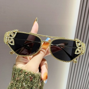 Luxurious gold metal butterfly sunglasses with rhinestones and dark polygon lenses