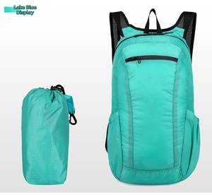 Lake blue foldable backpack showing both stored compact state and expanded nylon fabric detail