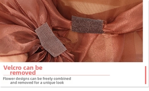 Detail view of the detachable organza bow with hook and loop fastener on the sun hat