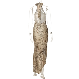 Detail view of leopard print halter maxi dress featuring an irregular hemline and tie-back design