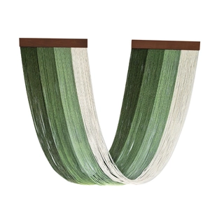 Modern boho woven tapestry with green gradient tassels and wooden hangers for wall decor